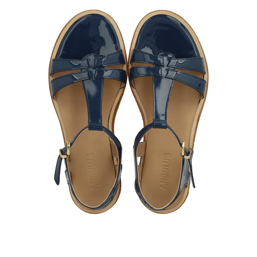 Feminine sandal with strap design