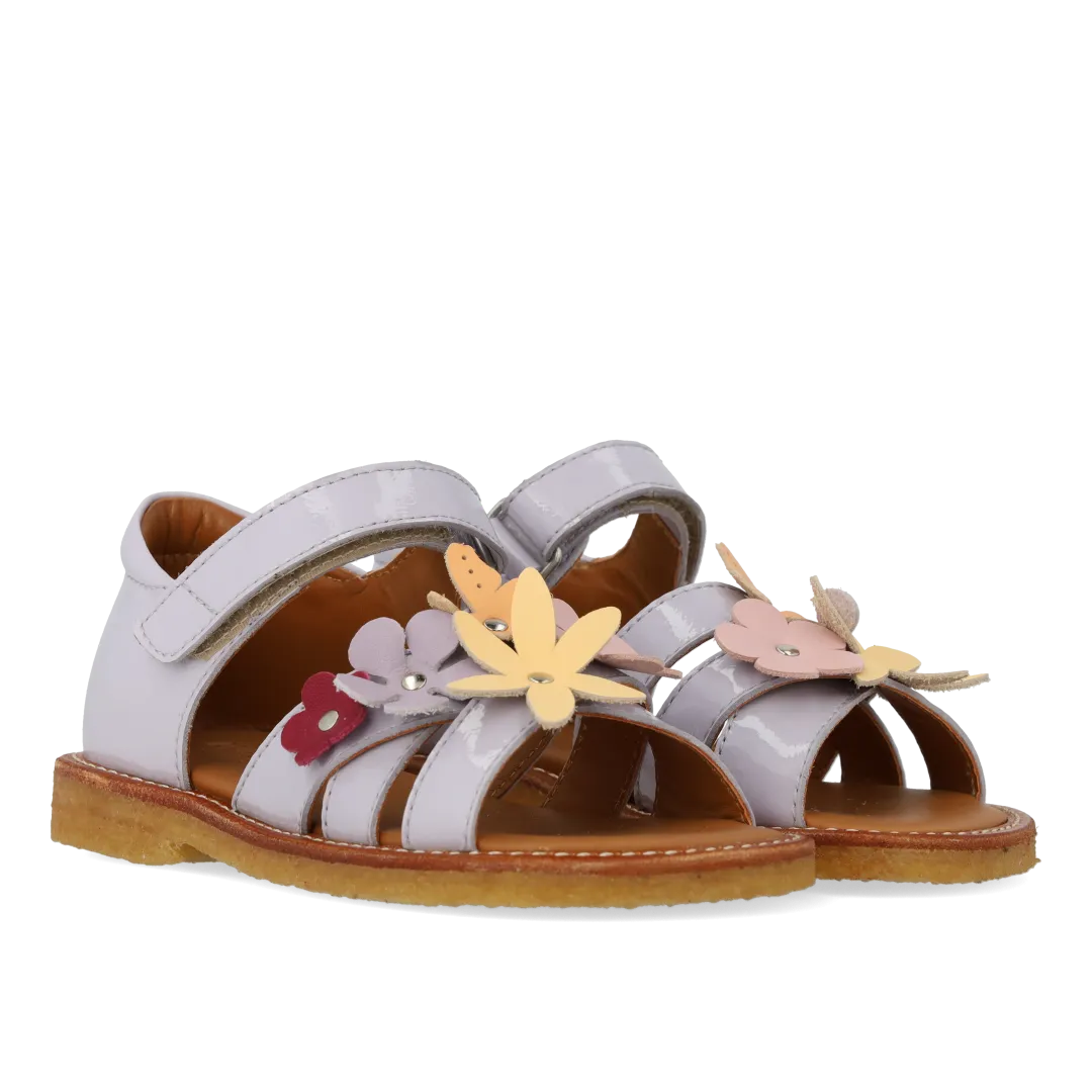 Sandal with multicoloured floral applications