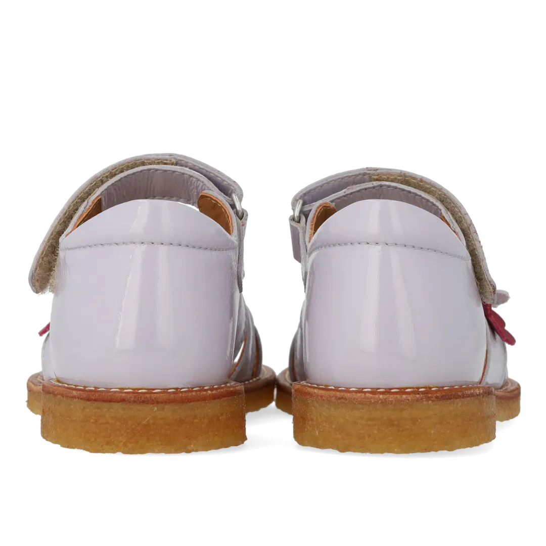 Sandal with multicoloured floral applications