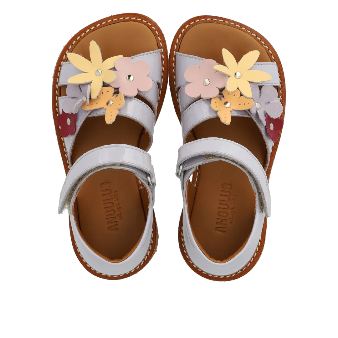 Sandal with multicoloured floral applications