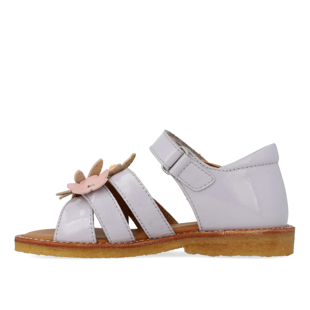 Sandal with multicoloured floral applications