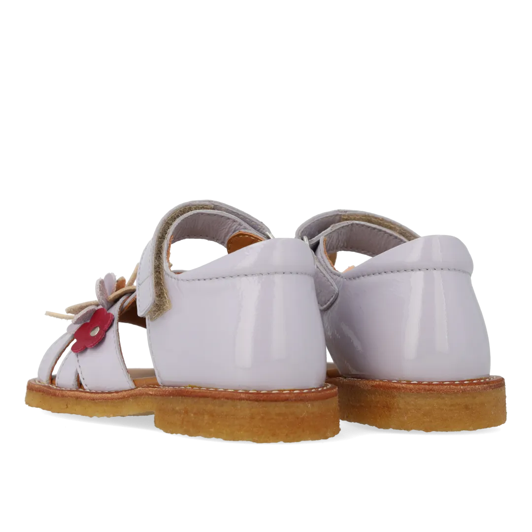 Sandal with multicoloured floral applications